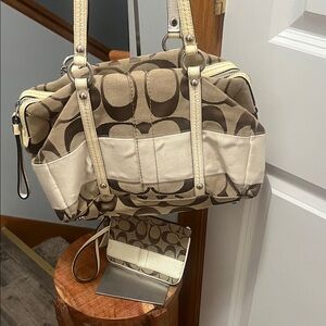 Stylish Beige and Brown Coach bag with matching wristlet